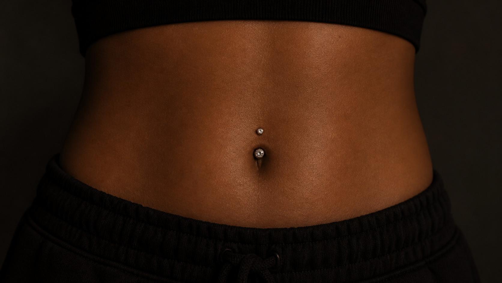Body piercing: belly button navel piercing