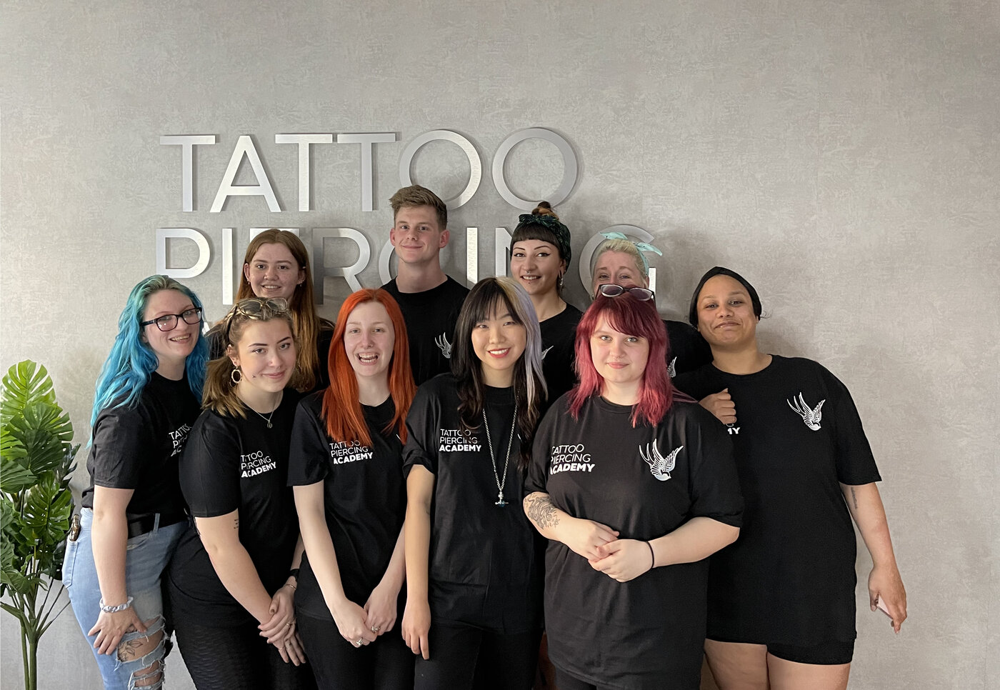 A group of body piercing course students at Essex Piercing Academy